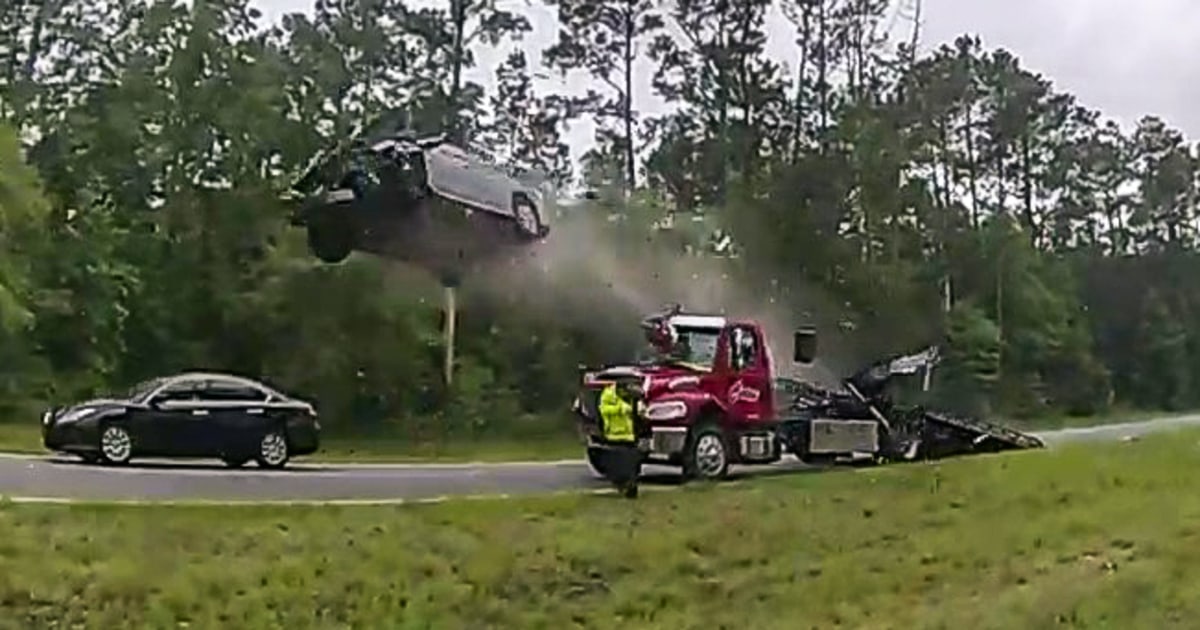 Police Video Shows A Car Rocketing Off A Tow Truck On A Georgia Highway   230531 Car Launches Off Tow Truck Ew 655p 97af4c 