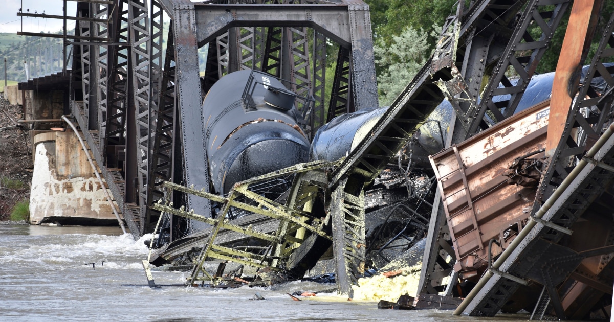 Train carrying hazardous materials derails and bridge collapses into Montana river