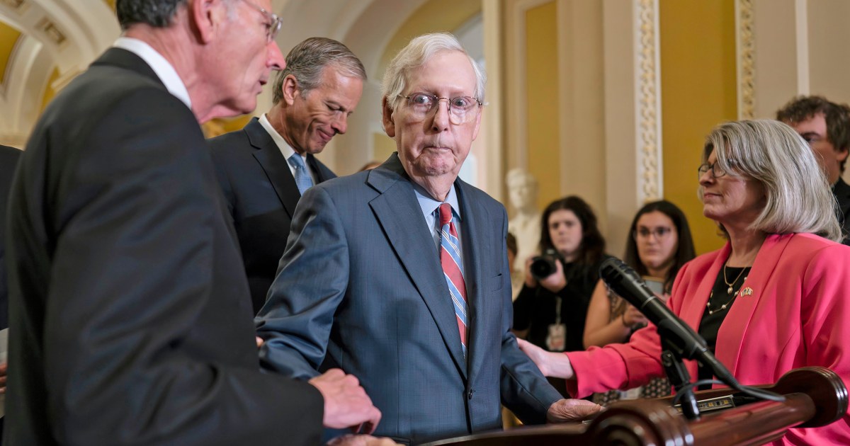 #Mitch McConnell escorted away from cameras after freezing during a news conference