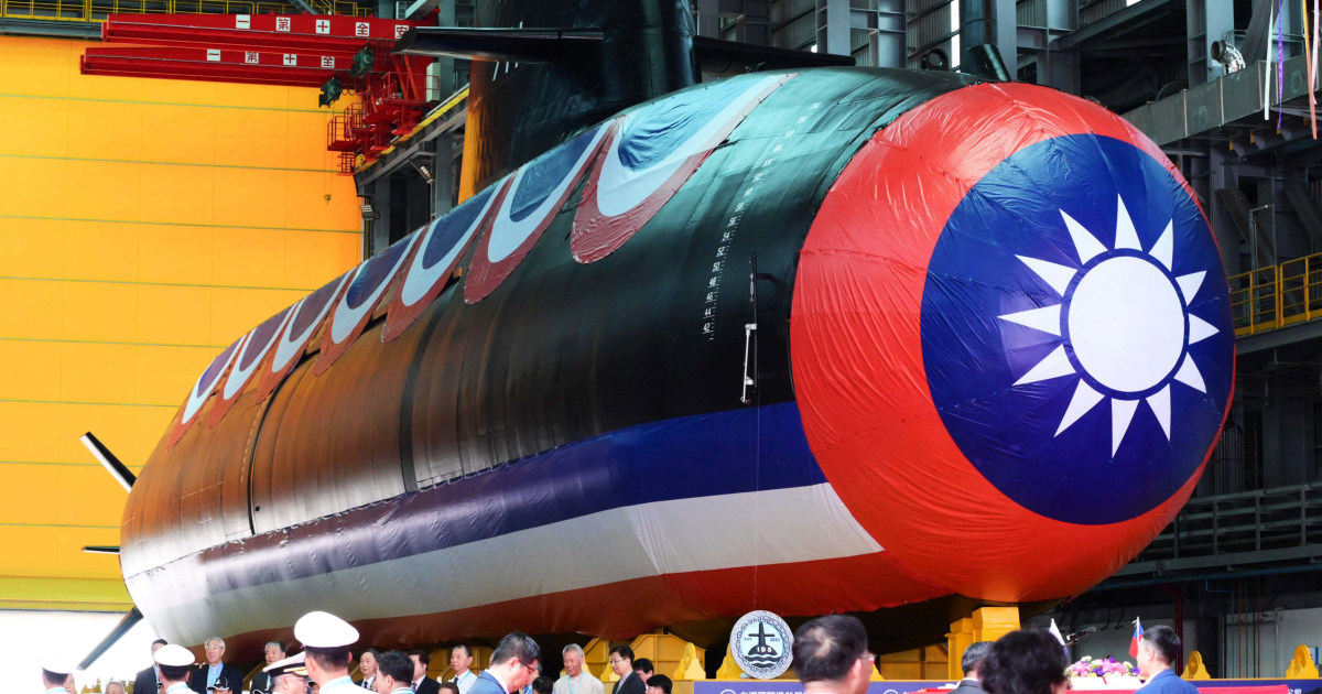 Taiwan reveals first homemade submarine amid China's threats
