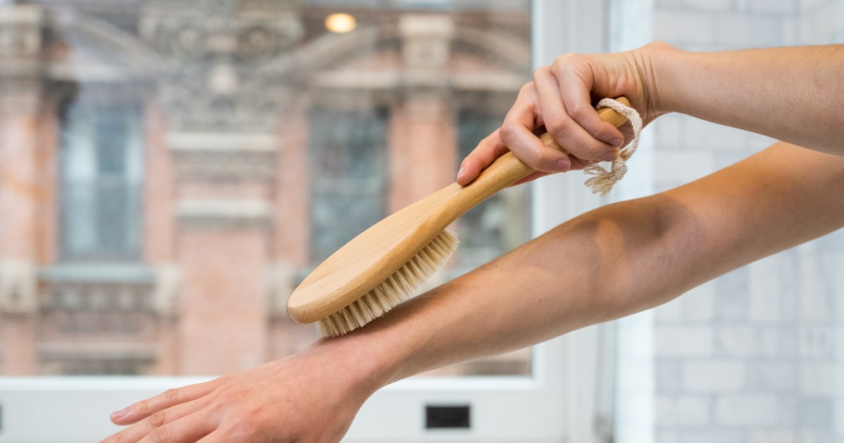 Derms do *not* recommend dry brushing your skin in this spot