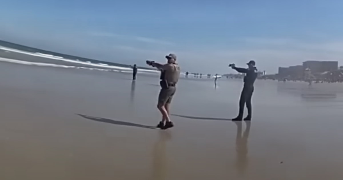 Видео показва как тийнейджър дърпа пистолет на плажа във Флорида, блъска се в Атлантическия океан в сблъсък с депутати