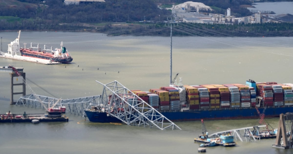 Containers being moved from ship to access fallen Baltimore bridge’s roadway