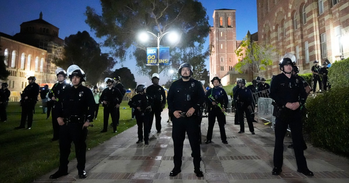 Campus protests live updates: Police mass at UCLA as protesters defy order to leave