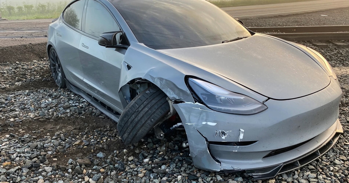 A Tesla owner says his car’s ‘self-driving’ technology failed to detect a moving train ahead of a crash caught on camera