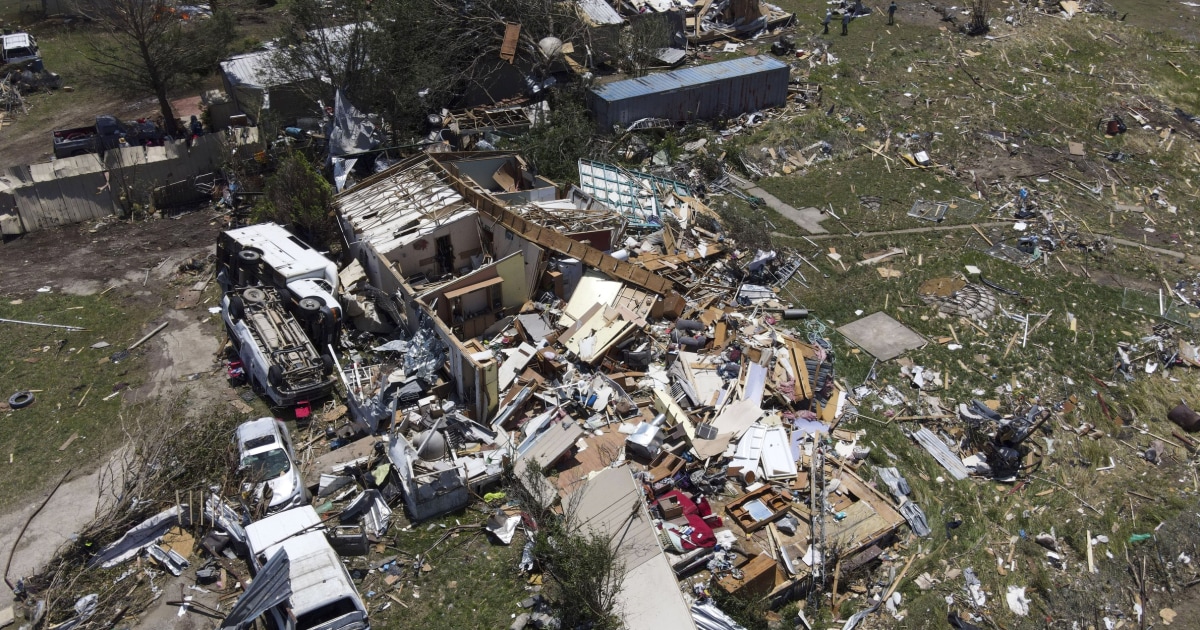 At least 19 dead as tornadoes, storms hit central US