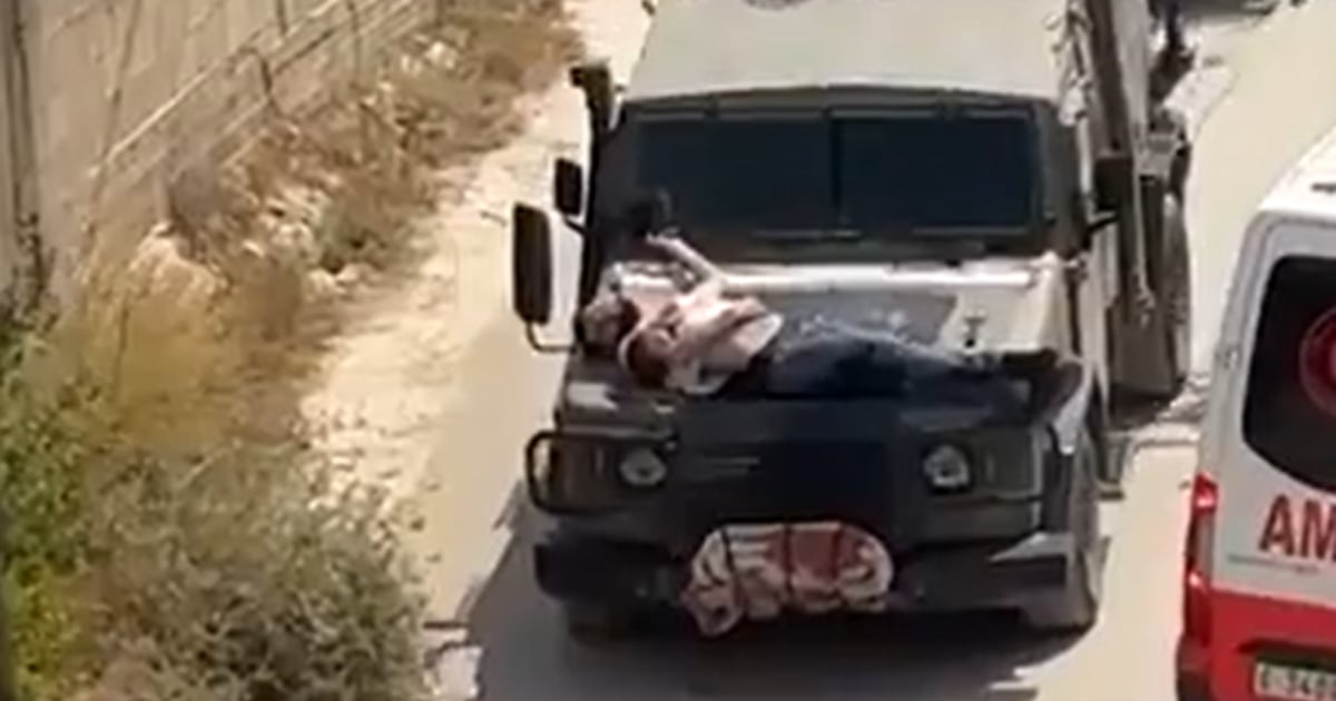 Outrage over video of Israeli soldiers driving with injured Palestinian strapped to a jeep