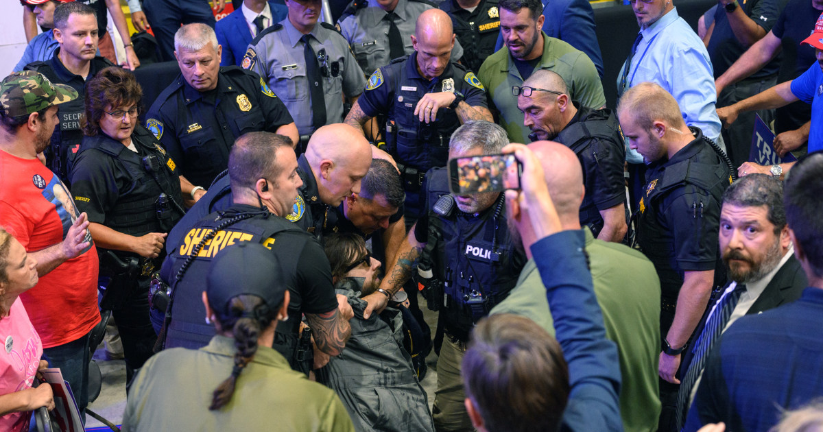 Protester who interrupted Trump rally to face charges, police say