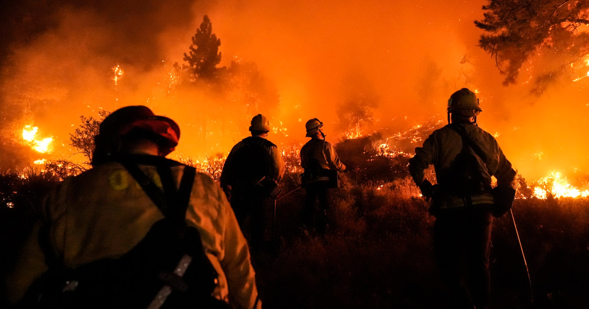 Bridge fire takes on proportions, man arrested in connection with line fire