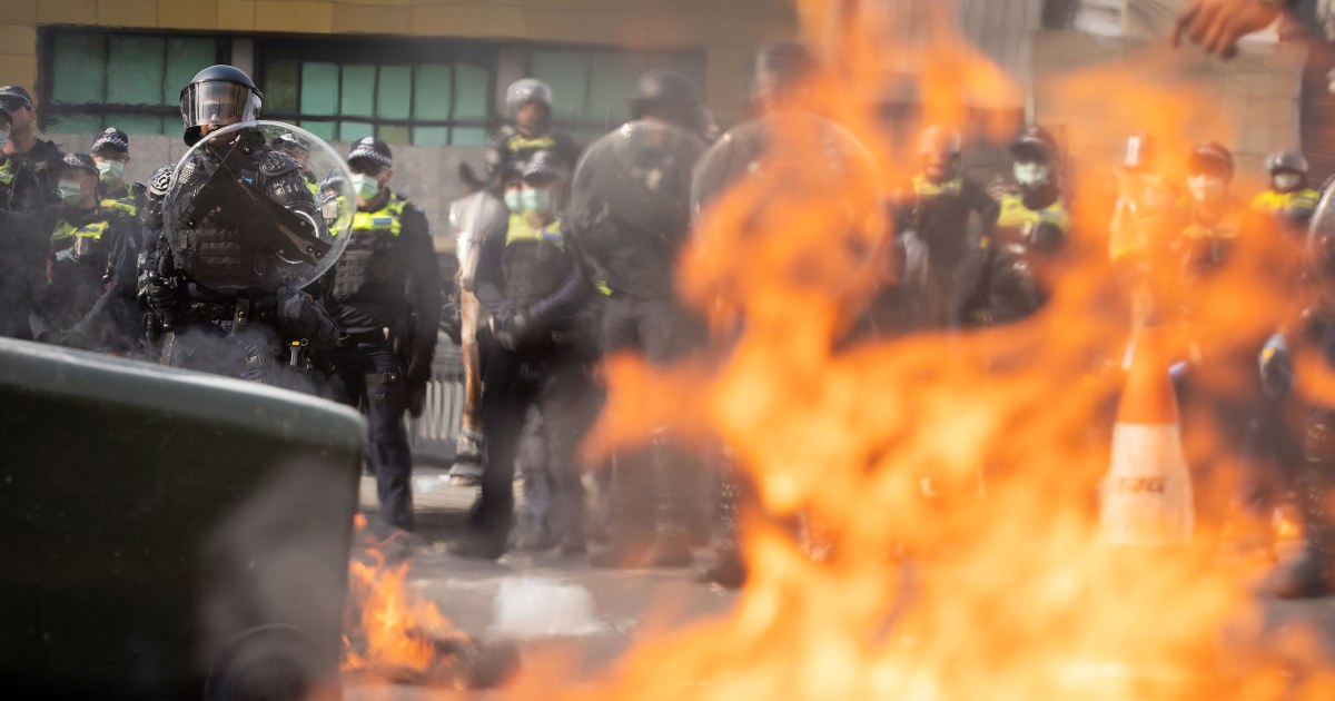 Anti-war protesters in Australia clash with police outside a weapons convention