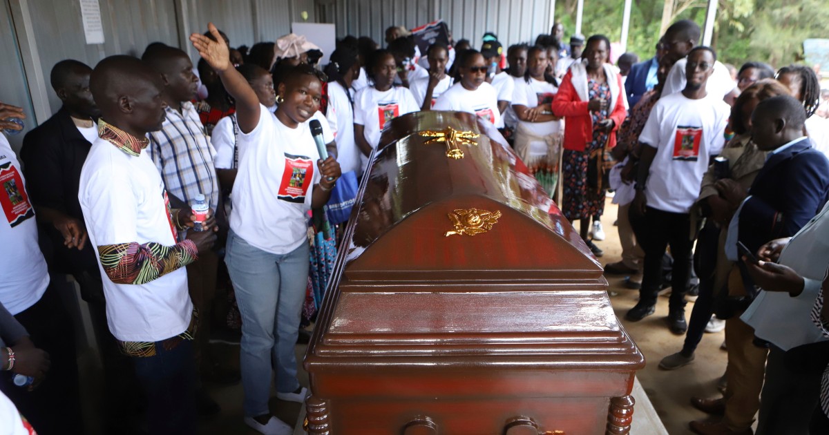 Slain Ugandan Olympian buried with full military honors