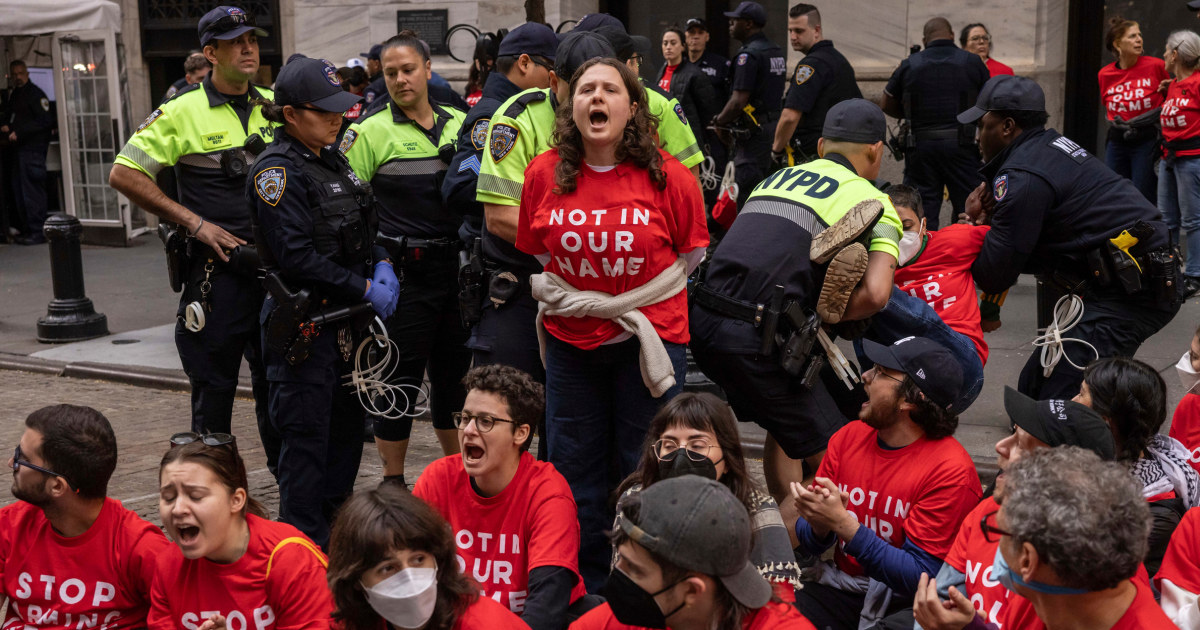 Protesters stage sit-in outside New York Stock Exchange to spotlight Gaza attacks