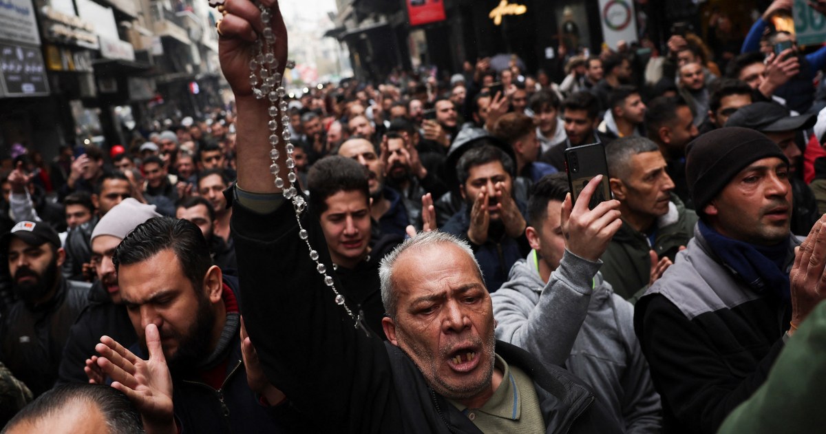 Hundreds protest in Damascus after Christmas tree set ablaze