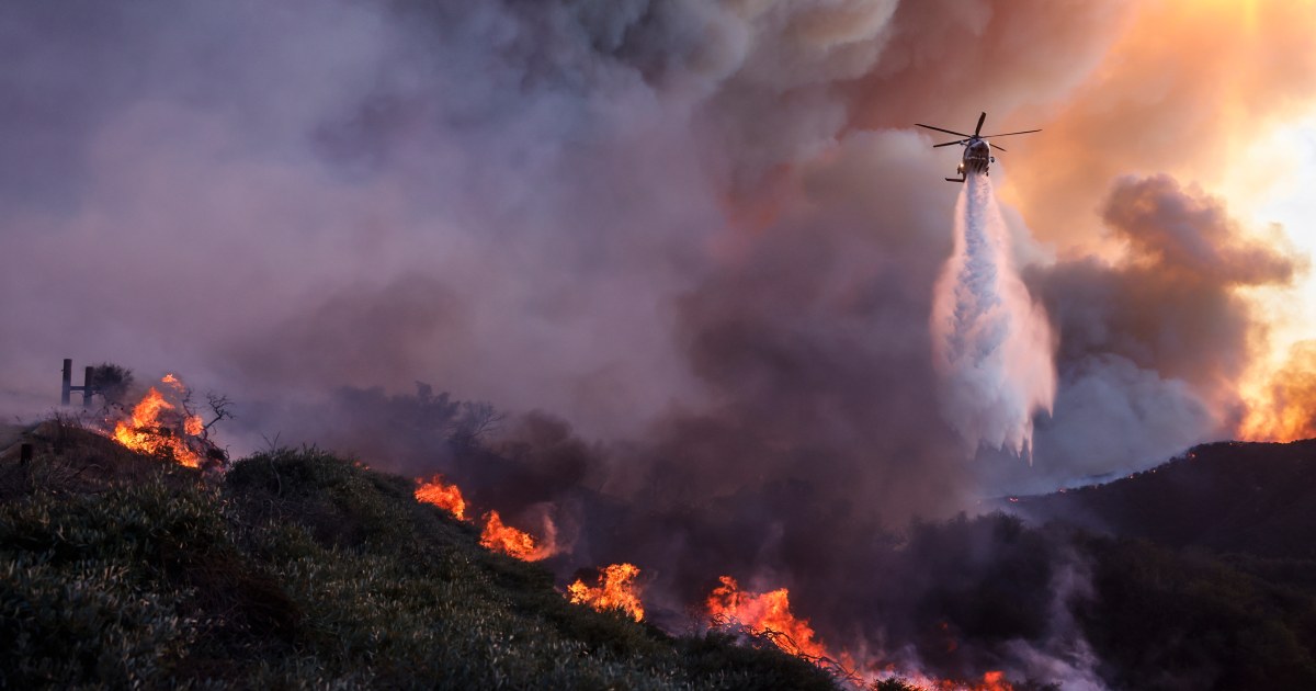 Flames engulf Southern California as crews battle to control Palisades Fire