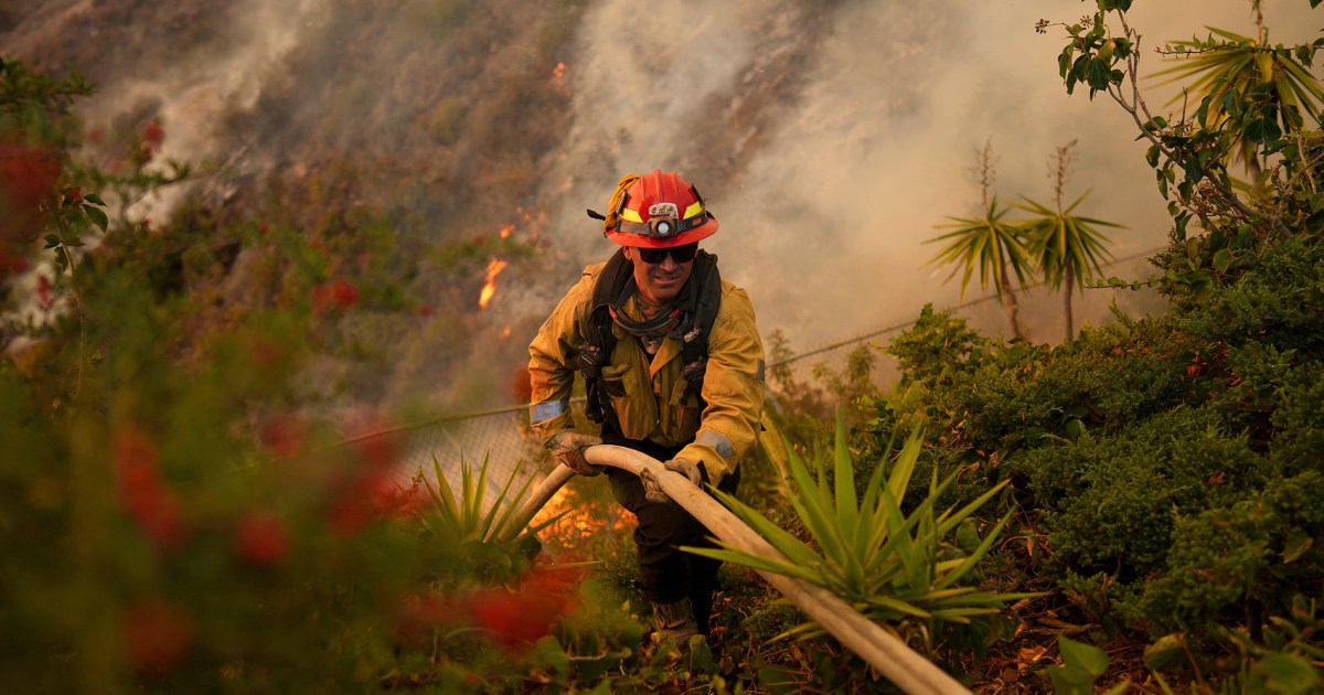 Firefighters battle to include L.A. fires as Santa Ana winds are forecast to choose again up