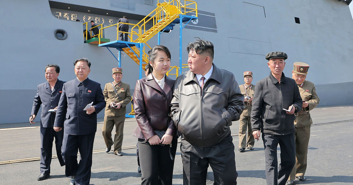 New North Korean warship is partly crushed at launch ceremony as leader Kim looks on