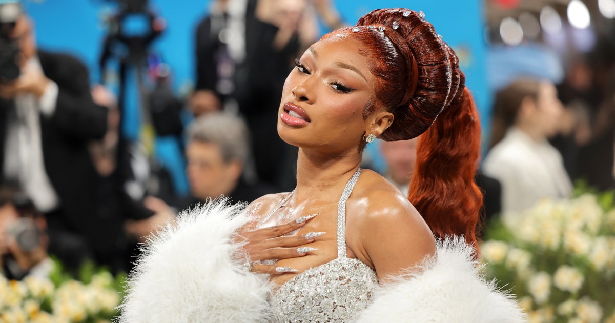 Megan Thee Stallion breaks no-phone rule at Met Gala to review the food