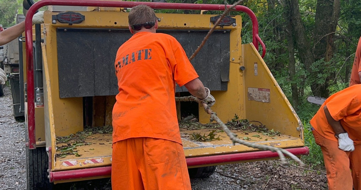 Oklahoma inmates clear debris to free family trapped for more than a week