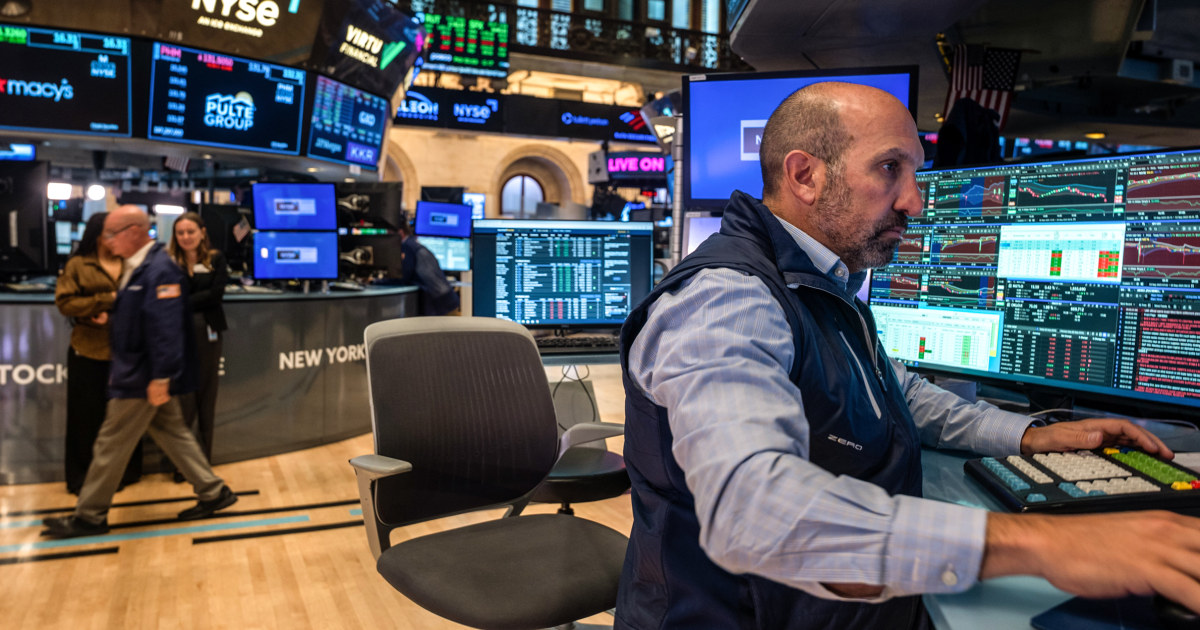 Nasdaq, S&P 500 end higher with Alphabet, Apple, rate-cut hopes; Dow dips