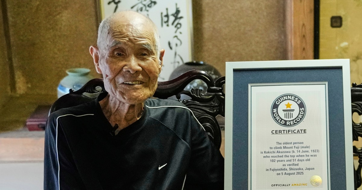 Japanese man becomes oldest to summit Mount Fuji at 102 with help from his family