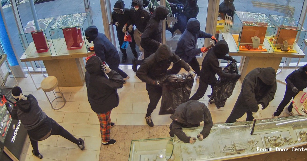 Video shows mob of armed robbers swarm California jewelry store in smash-and-grab