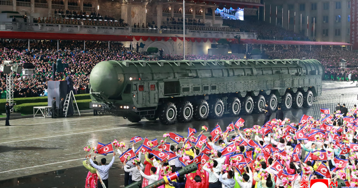 North Korea displays new long-range missile at a military parade celebrating Kim Jong Un