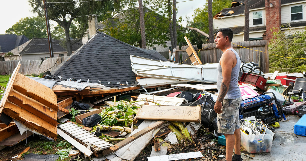 Tornado strikes near Houston, damaging 100 homes and leaving thousands without power