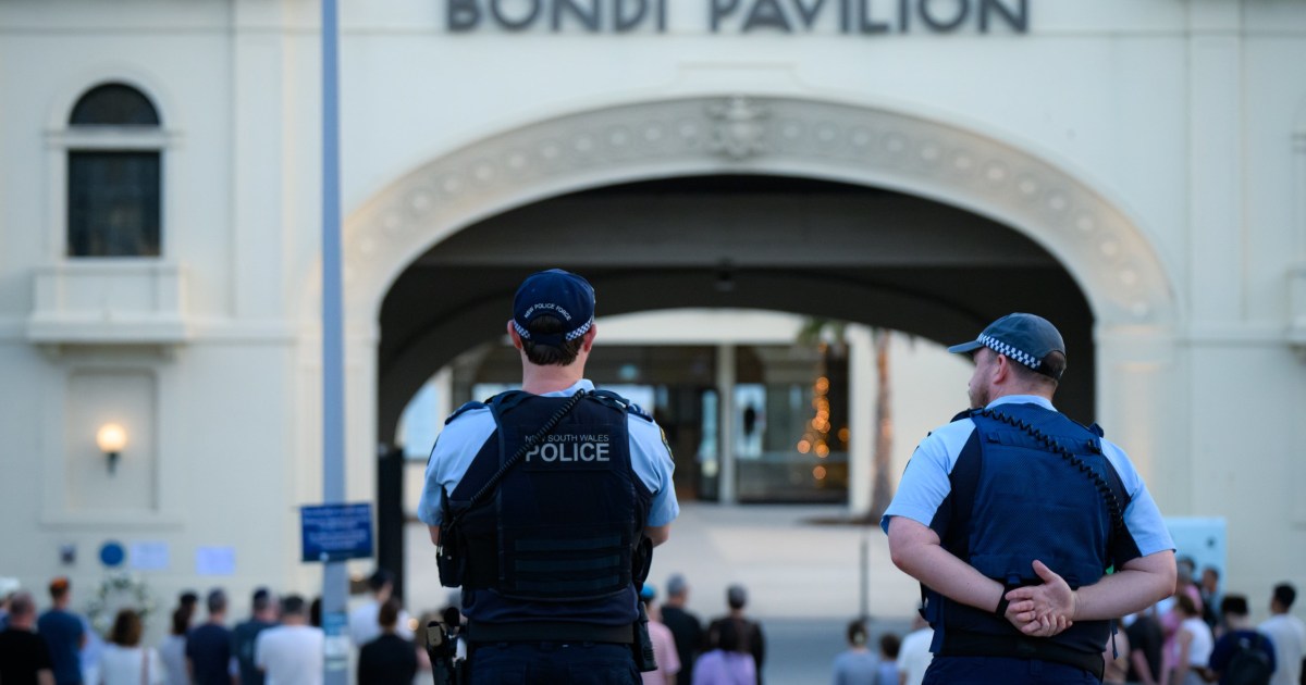 Police arrest man accused of celebrating Bondi Beach shooting, discover ammunition cache