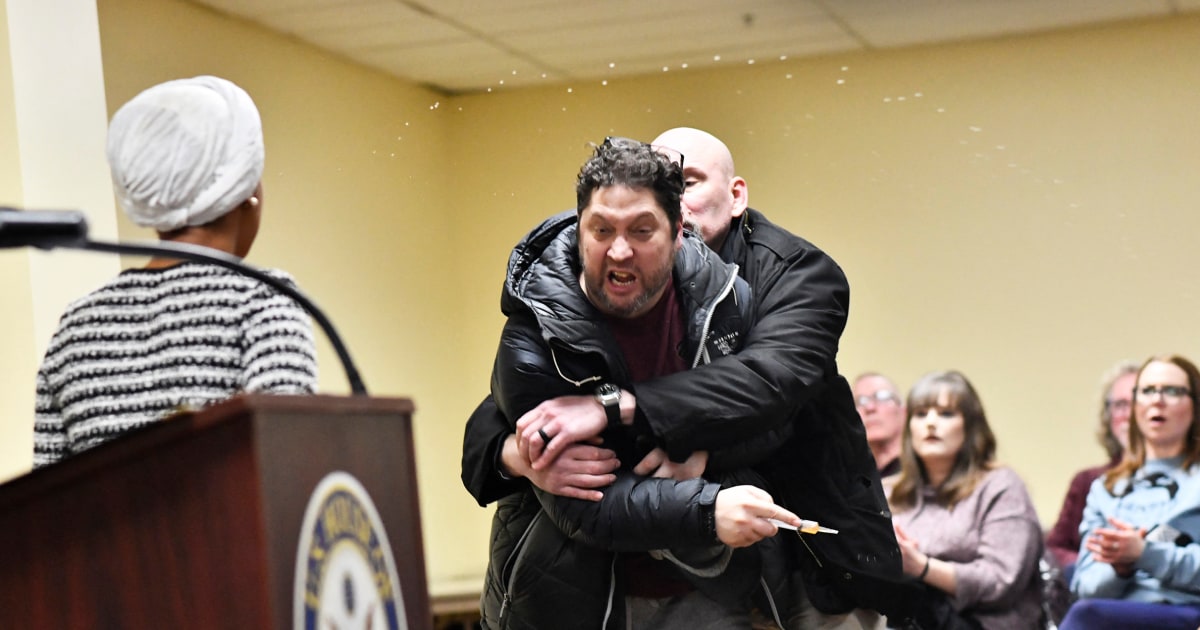 The Minnesota Democrat wasn't injured, and she continued speaking after the incident. Police said the man was arrested on suspicion of third-degree assault.