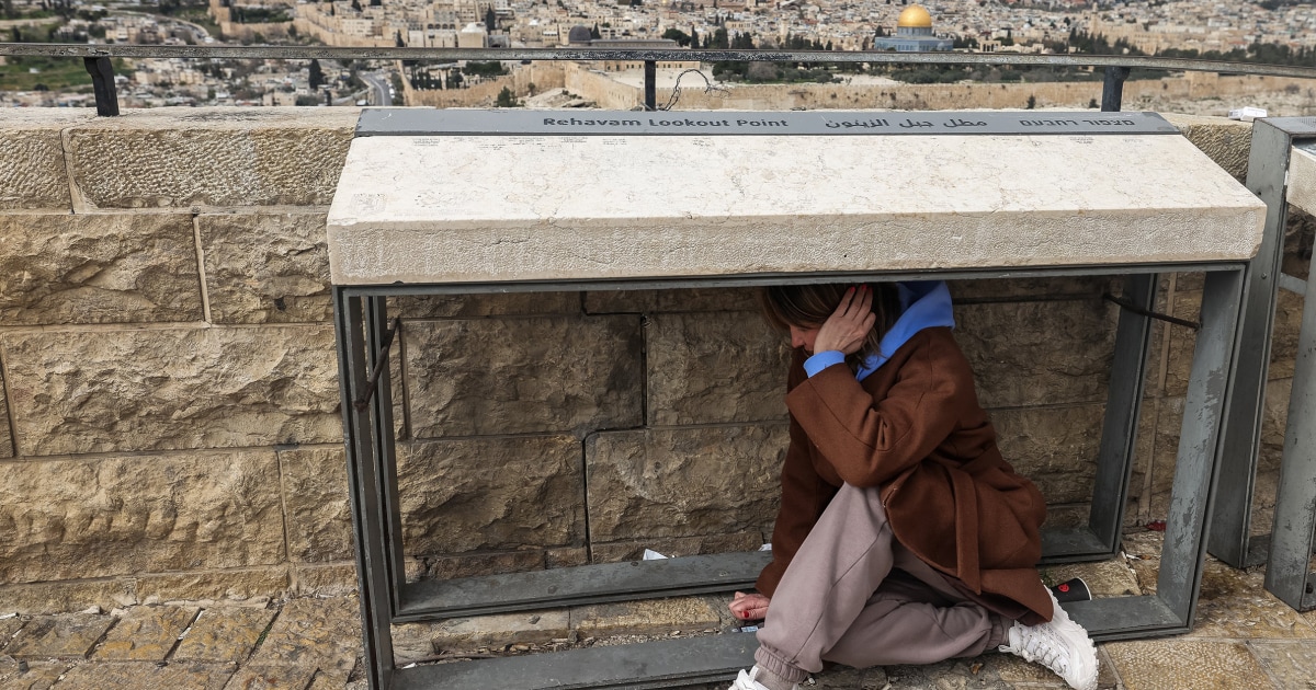 Photos: Israelis seek shelter as Iran launches retaliatory strikes