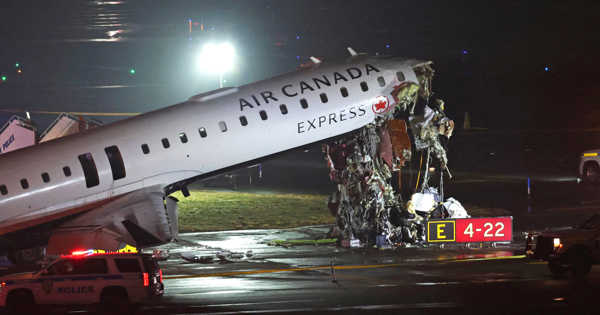 A pilot and co-pilot were killed when an Air Canada passenger plane collided with a fire truck on a LaGuardia Airport runway late Sunday, according to two sources familiar with the investigation