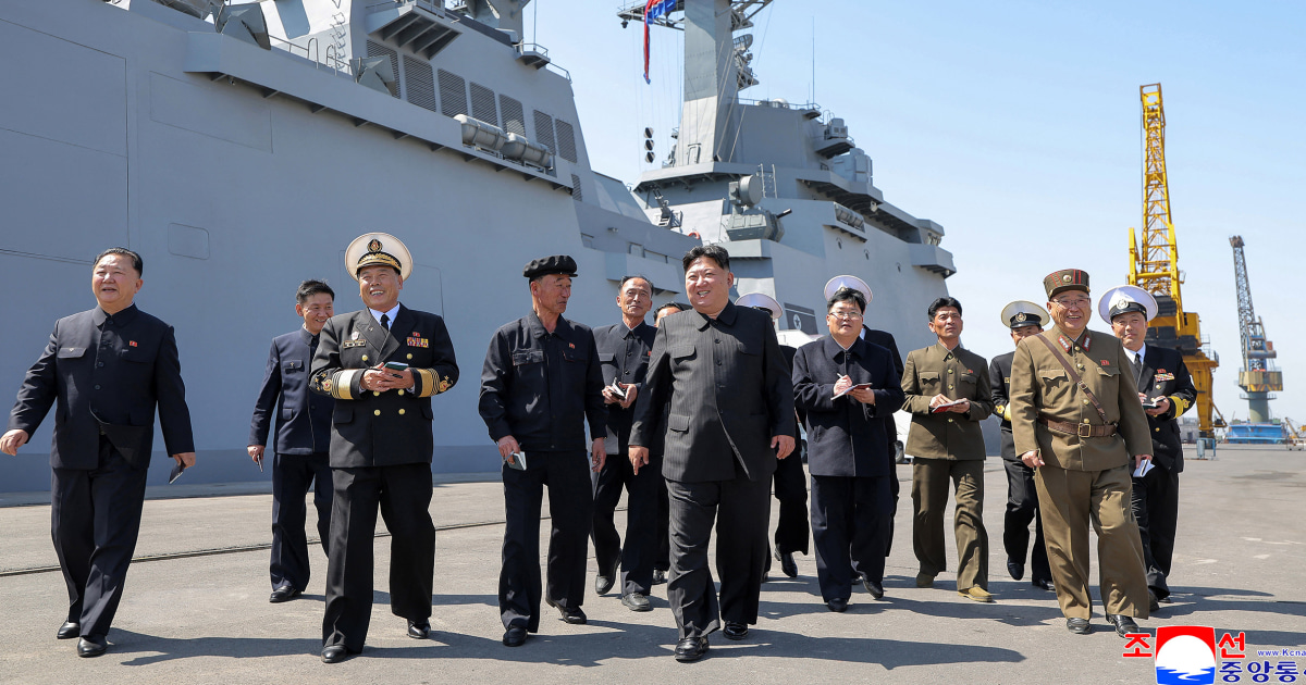 North Korea's Kim Jong Un supervises missile tests from his naval destroyer