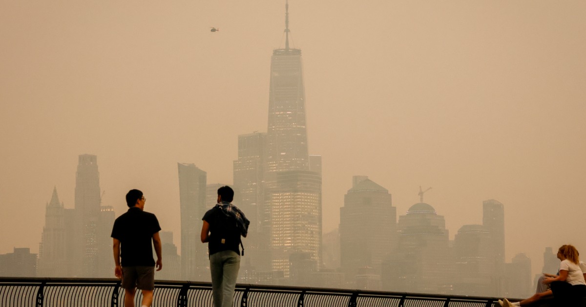 Heavy, pungent smoke from Canadian wildfires darkened skies in the U.S. on Thursday from the Great Lakes to parts of the East Coast, reducing visibility for commuters and prompting warnings that air quality could make being outside dangerous.