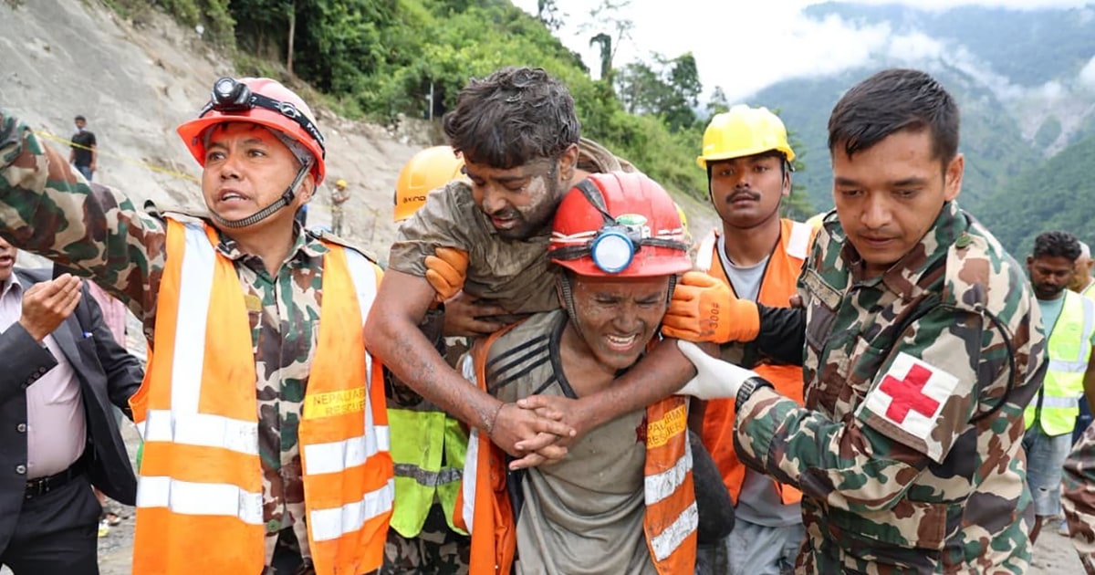 Two trapped workers are pulled alive from Nepal tunnel more than a week after deadly floods