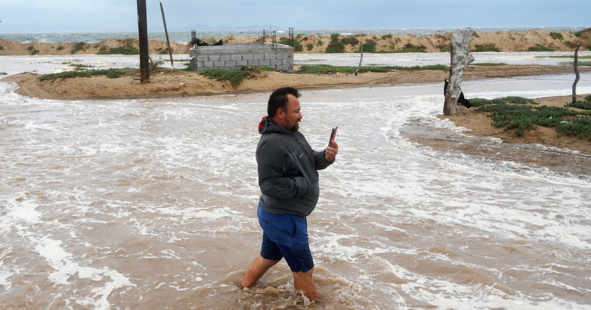 Wind whips Mexico’s northern Pacific coast and water begins to flood some streets as Hurricane Polo bears down on Baja California Sur, threatening flash floods and mudslides.