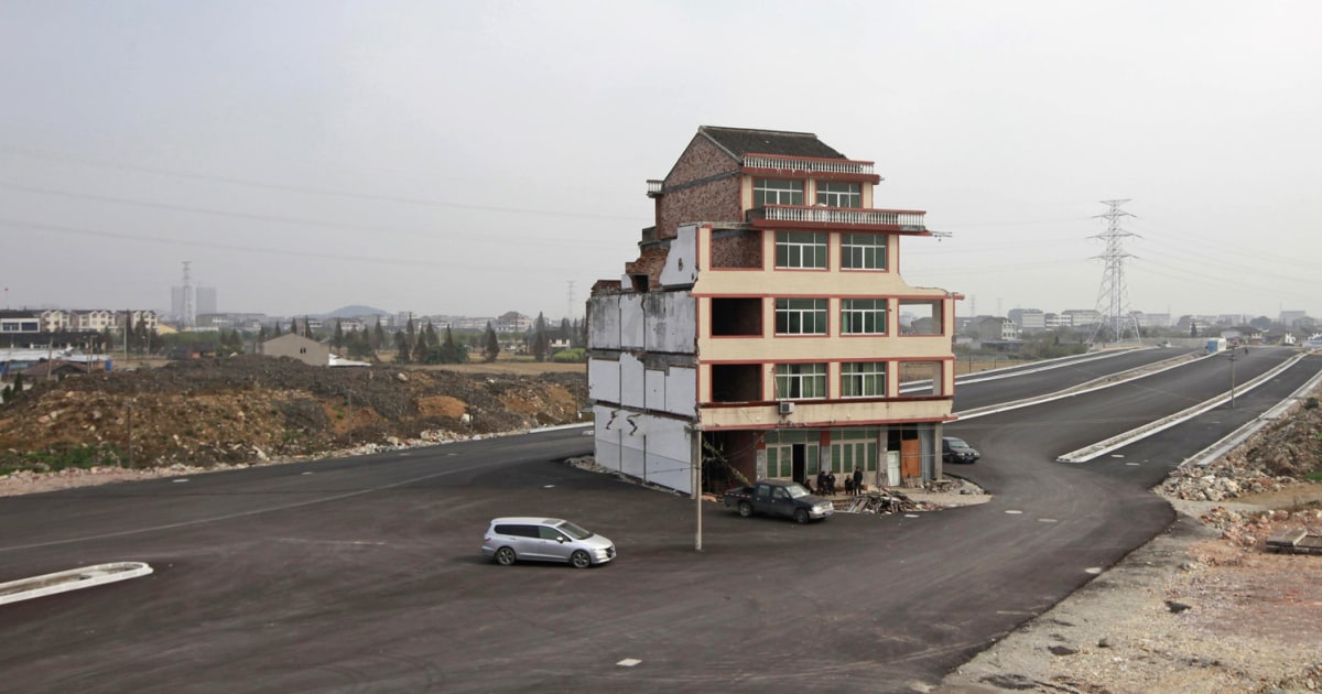 China tears down house in middle of highway after owner agrees to
