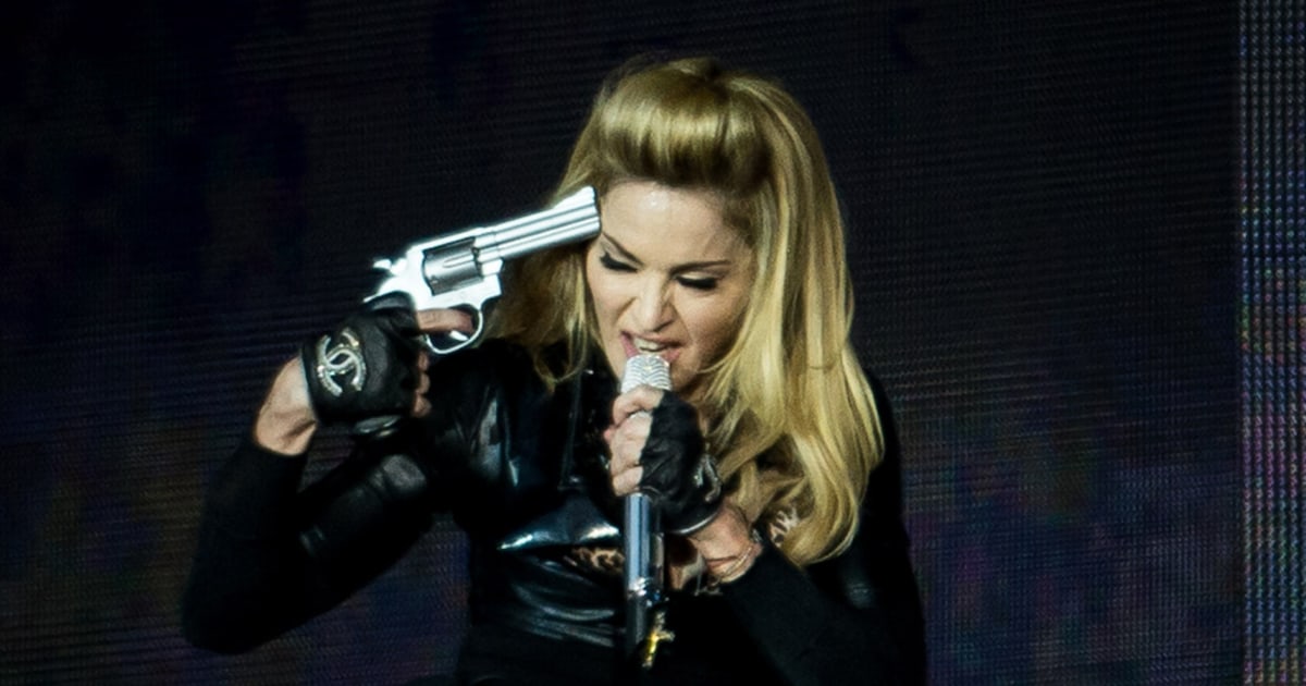 Madonna puts gun to her head in on-stage stunt