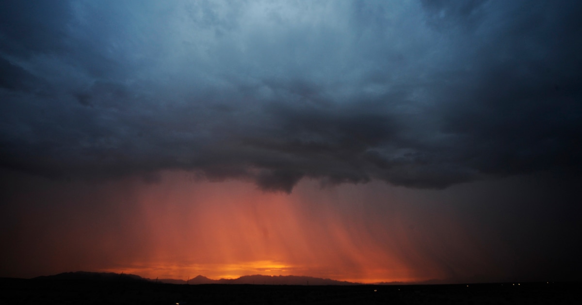 Monsoon moisture clouds a sunset along the California-Arizona border