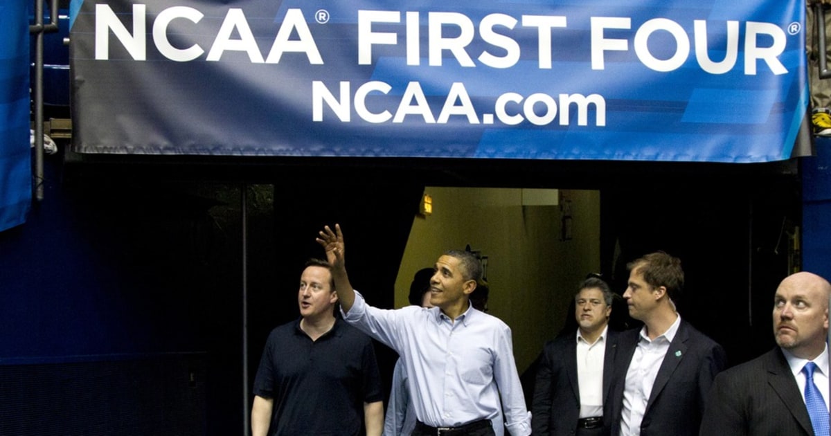 Obama lauds virtues of 'heartland' at NCAA game