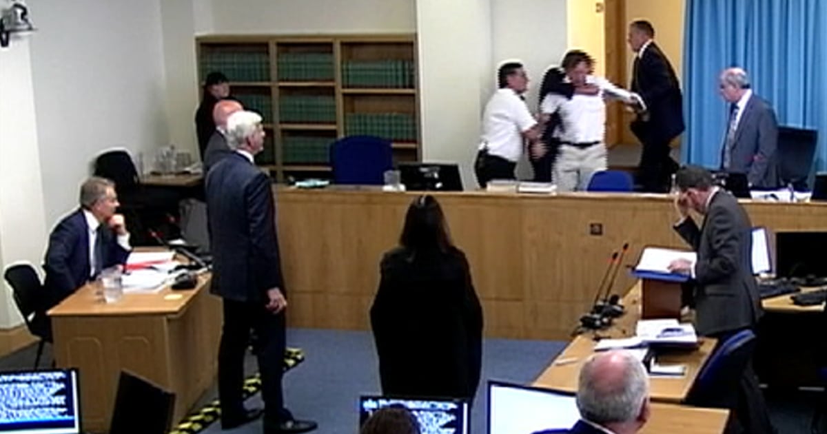Heckler calls Tony Blair 'a war criminal' as former British PM appears