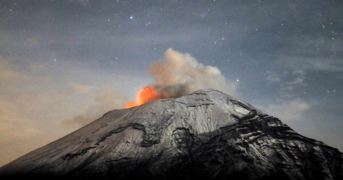 Mexico's Popocatepetl volcano spews ash into a starry night