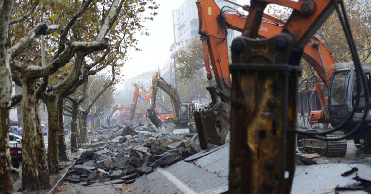 China probes oil pipelines as death toll from blast rises to 52