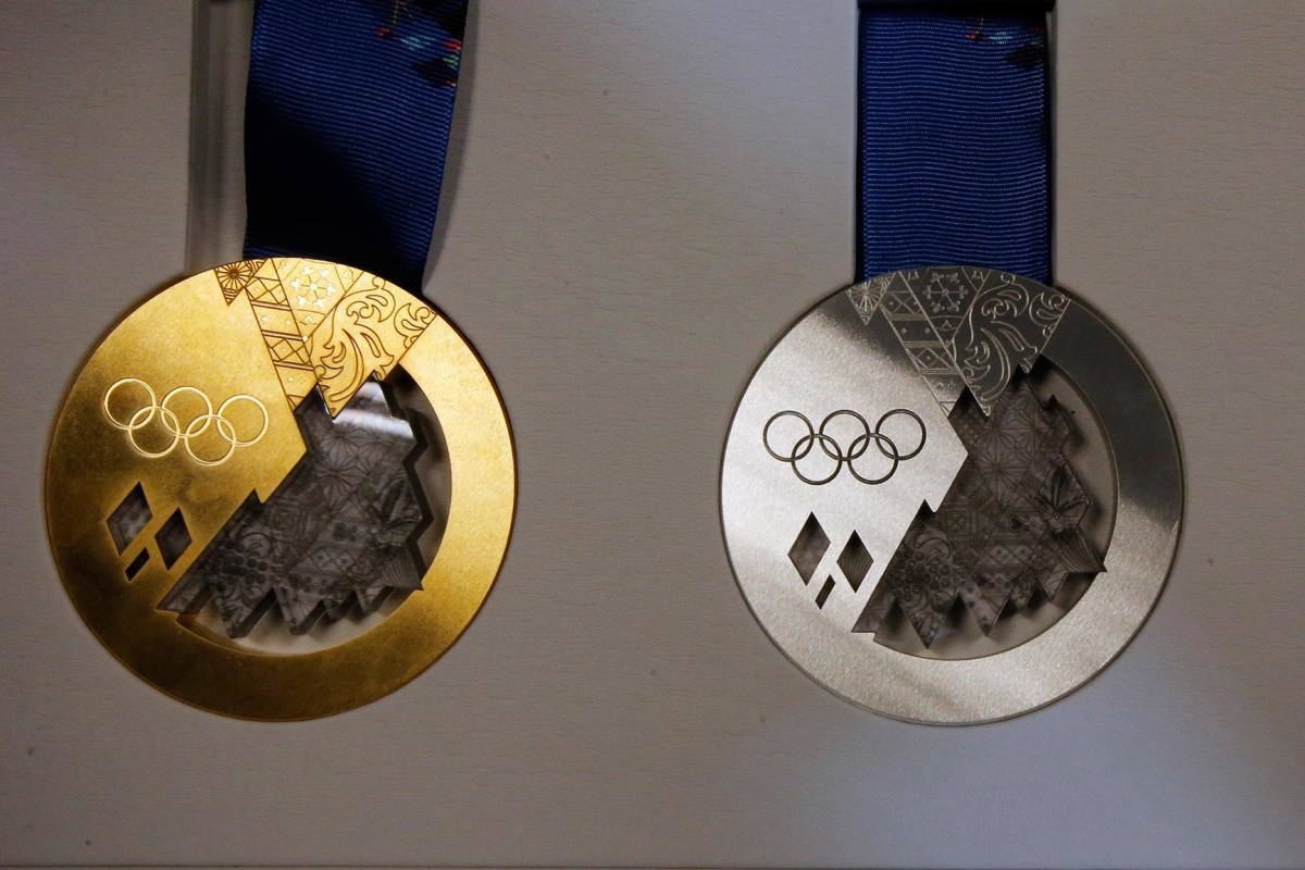 Игры сочи 2014 медали. Олимпийские медали Сочи 2014. Медаль Сочи 2014 от президента. Медали олимпиады 2014 Сочи. Самые красивые медали Олимпийских игр.