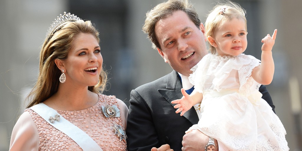 Sweden's Princess Madeleine, left holding Prince Nicolas stands next to her  husband Christopher O'Neill holding their daughter Princess Leonore, with  Queen Silvia and King Carl XVI Gustaf at right, during the christening