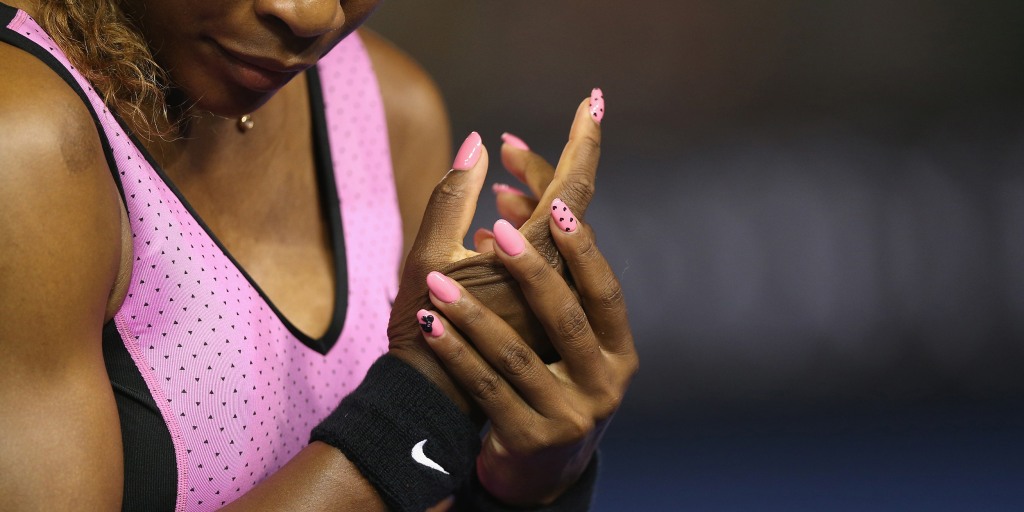 Usa's serena williams' nails glisten in the sun during the ladies singles  final on day twelve of the 2010 wimbledon championships at the all england  lawn tennis club, wimbledon. hi-res stock photography