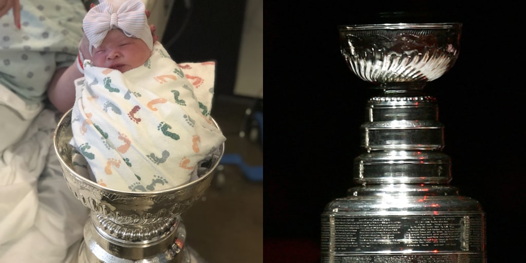 Peaceful baby in the Stanley Cup : r/aww