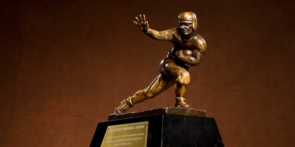 https://media-cldnry.s-nbcnews.com/image/upload/t_social_share_1024x512_center,f_auto,q_auto:best/rockcms/2024-12/heisman-triphy-mc-241211-d510bc.jpg