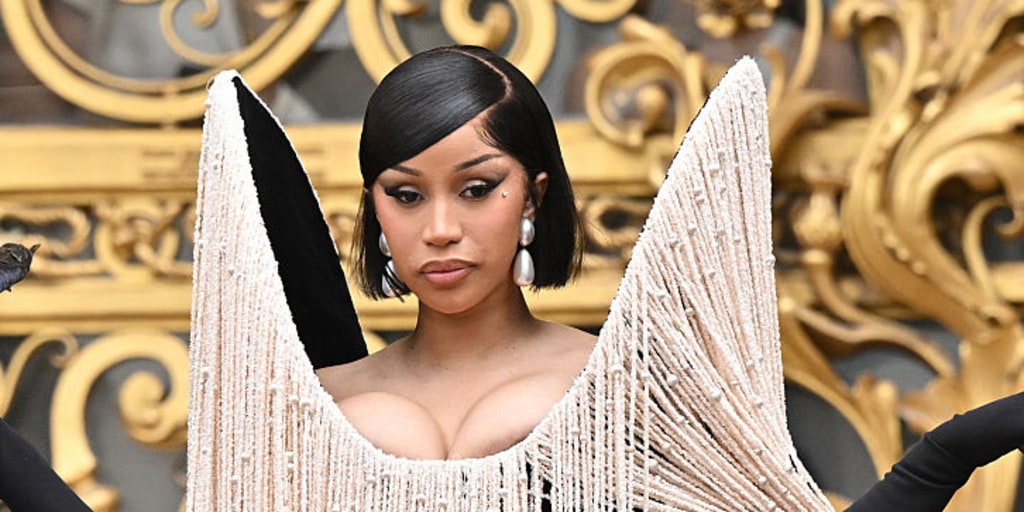 See Cardi B Accessorize Her Dress With a Live Crow