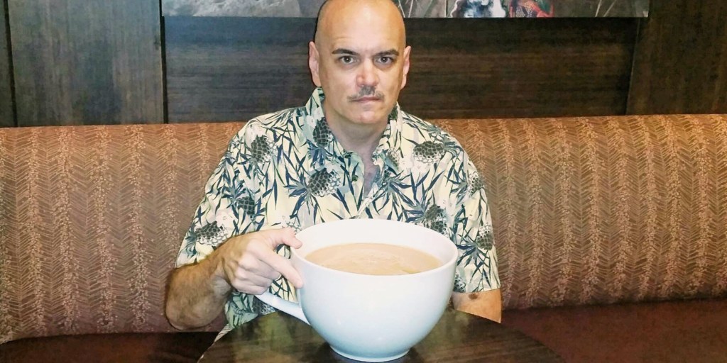 Man's 101-shot Starbucks coffee shatters drink challenge record