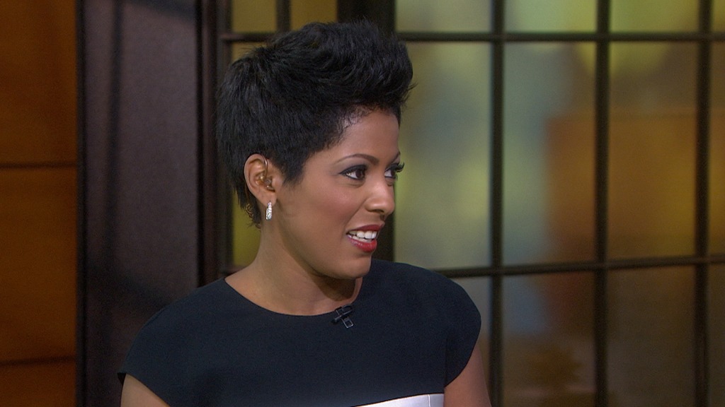 Tamron Hall tears muscle screaming in haunted house.
